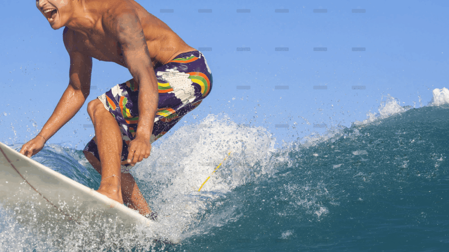 demo-attachment-690-surfing-excited-man-catching-wave